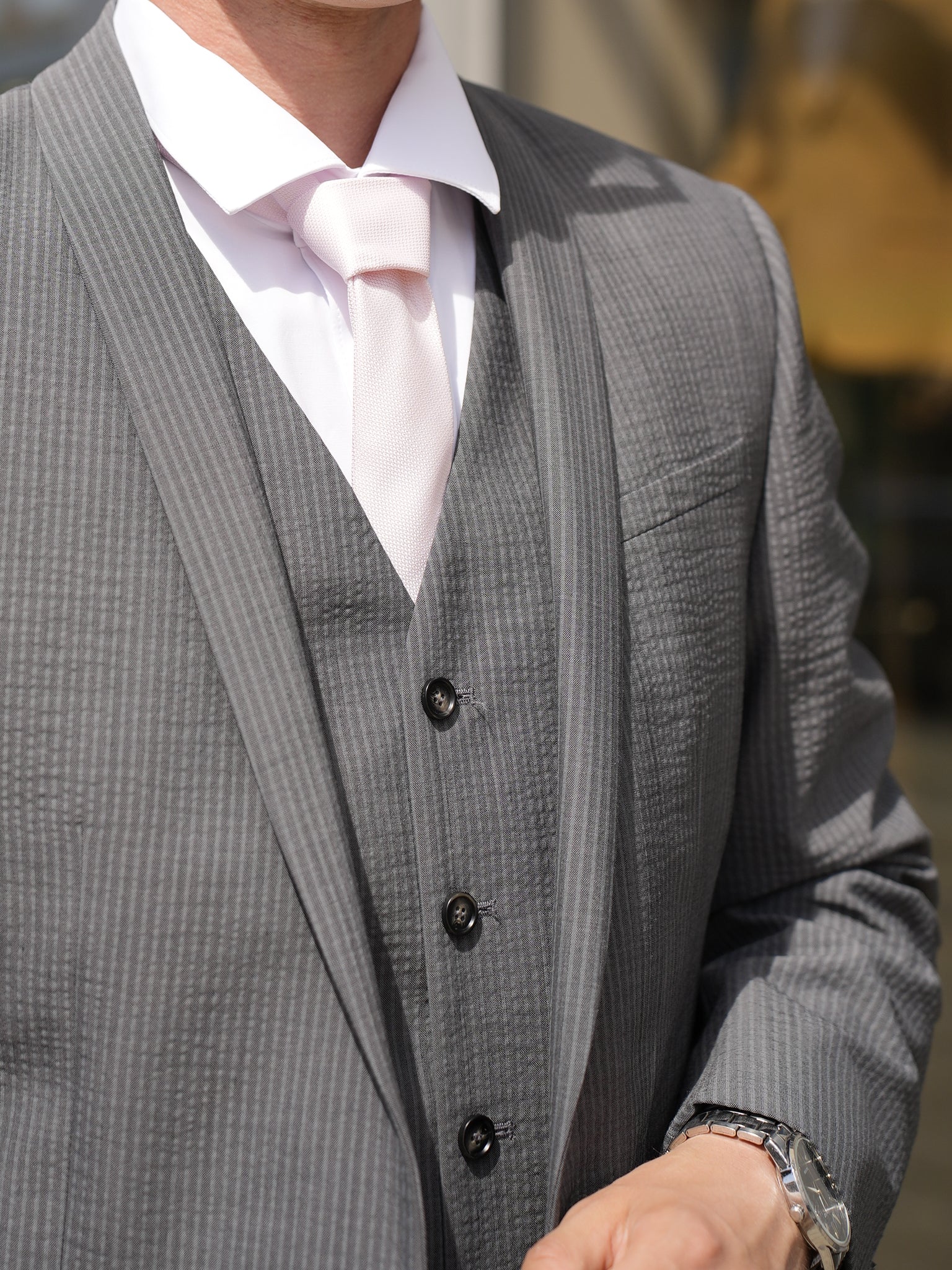 Gray three-piece suit