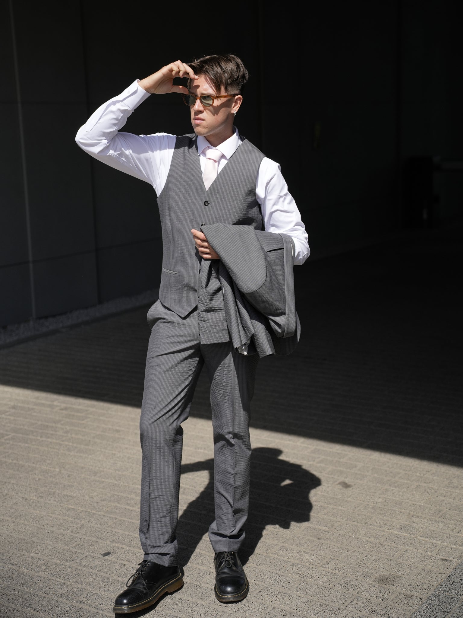 Gray three-piece suit