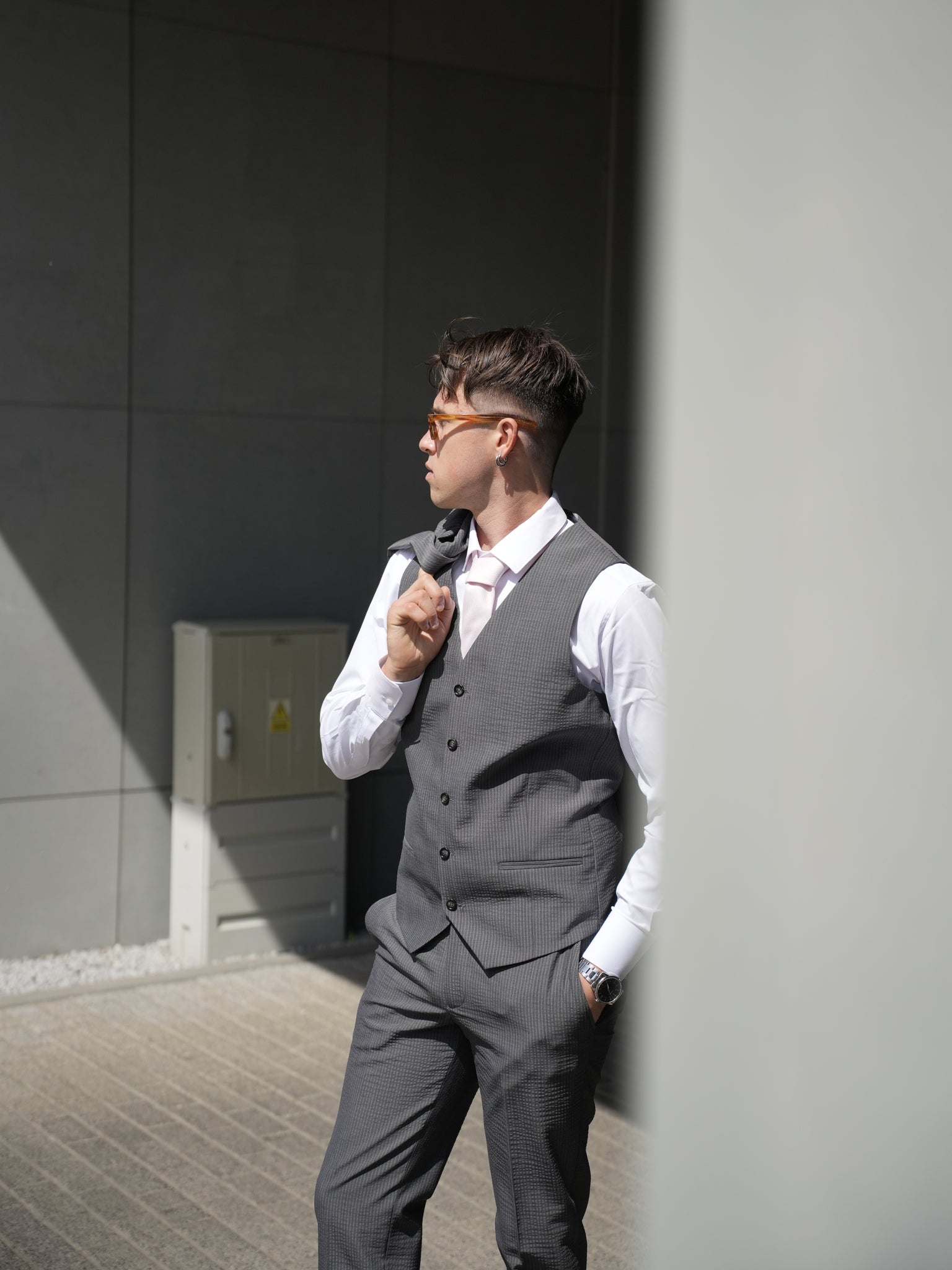 Gray three-piece suit