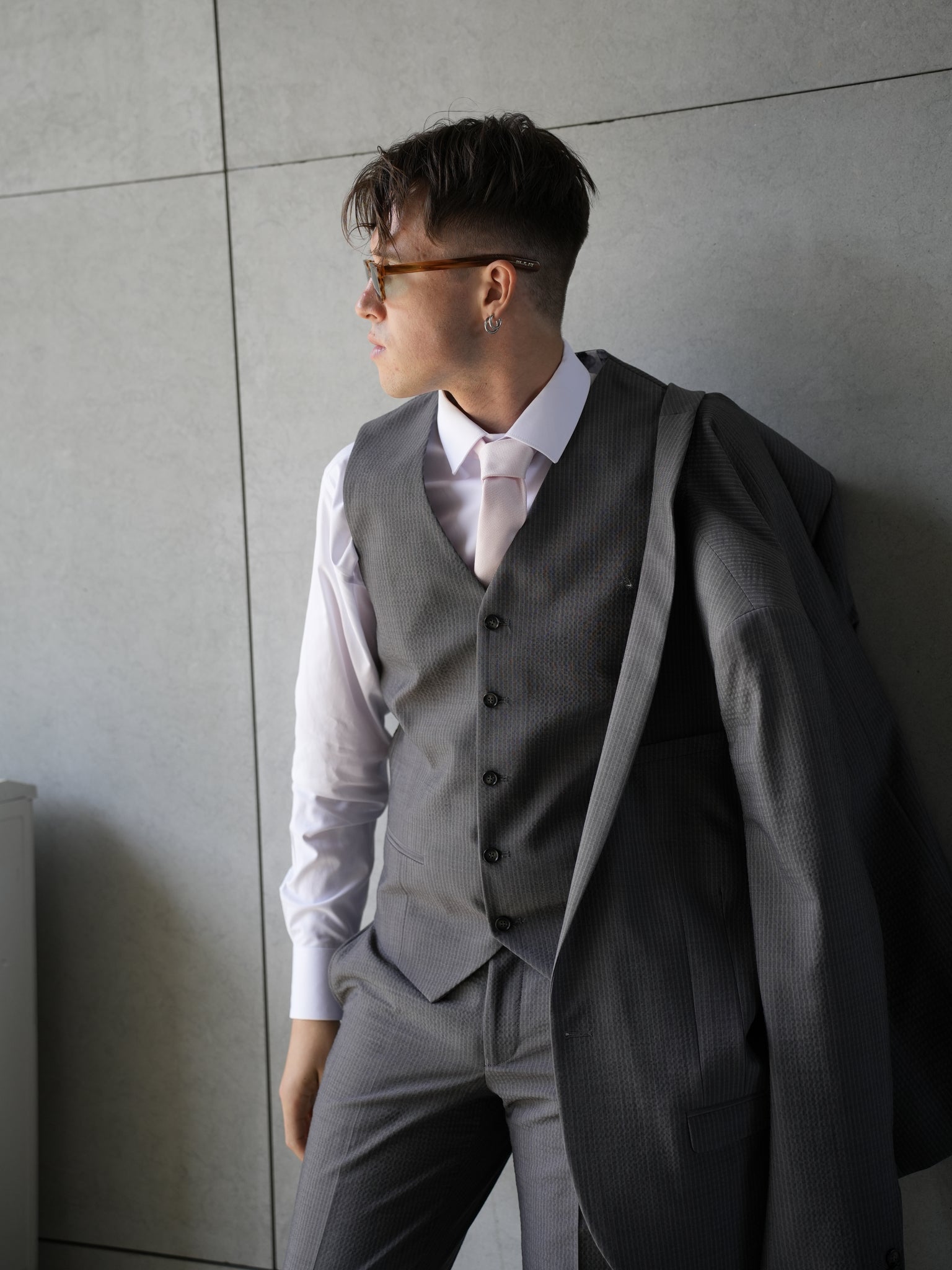 Gray three-piece suit