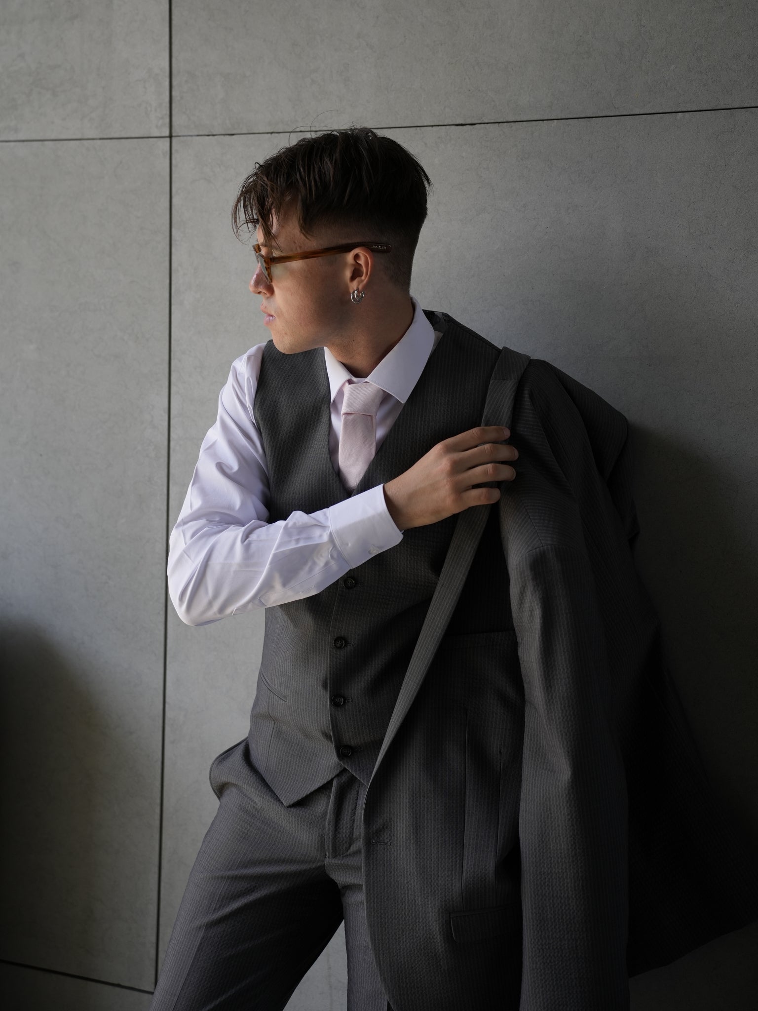 Gray three-piece suit