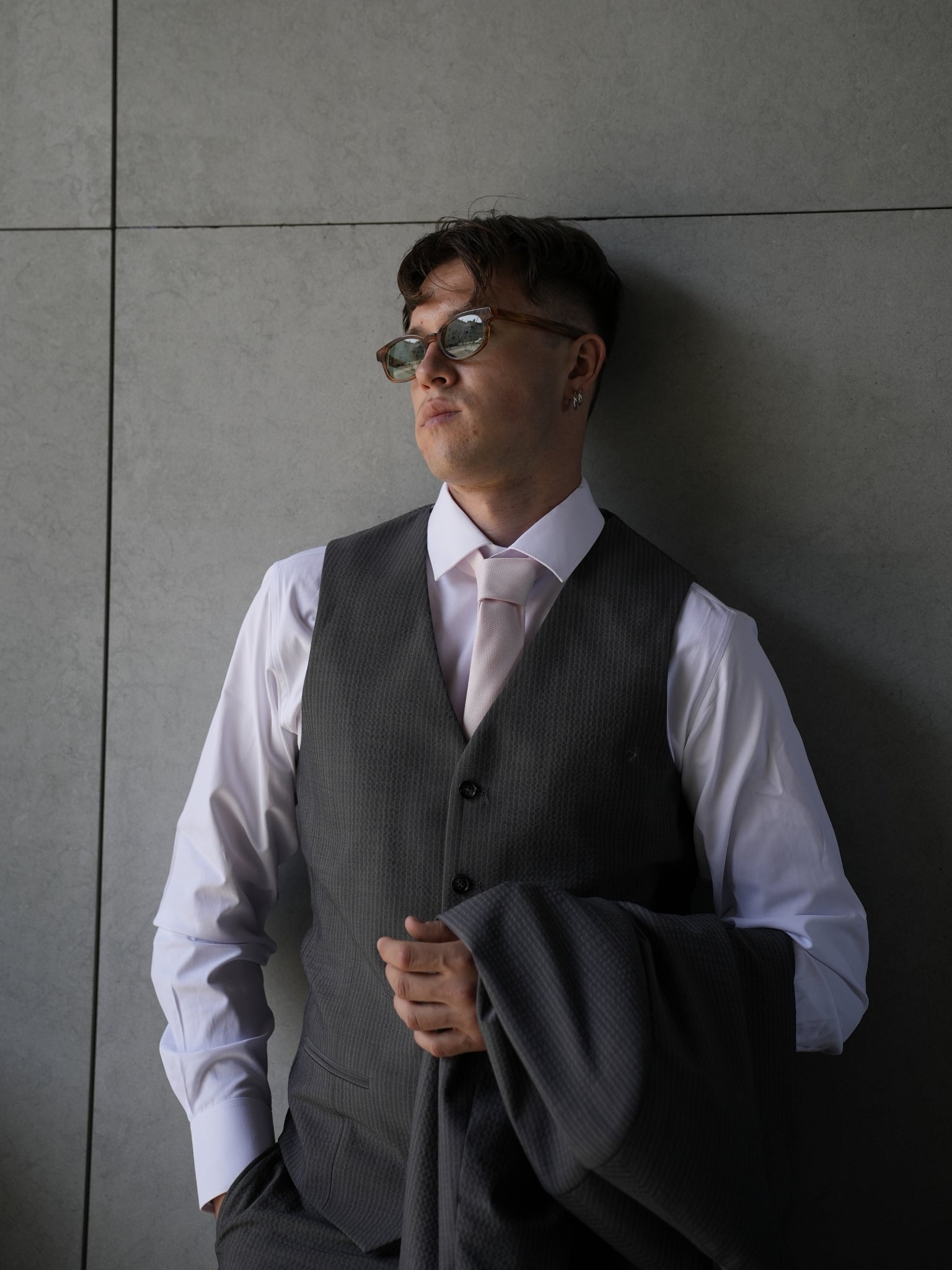 Gray three-piece suit